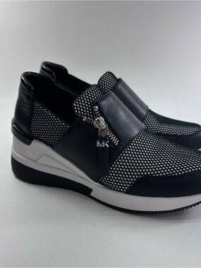 Michael Kors Chelsie Black and White Slip-On Trainer Sneakers
